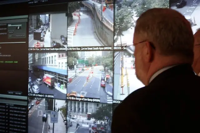 NYPD spokesman Paul Browne watches the screens of the Domain Awareness System.